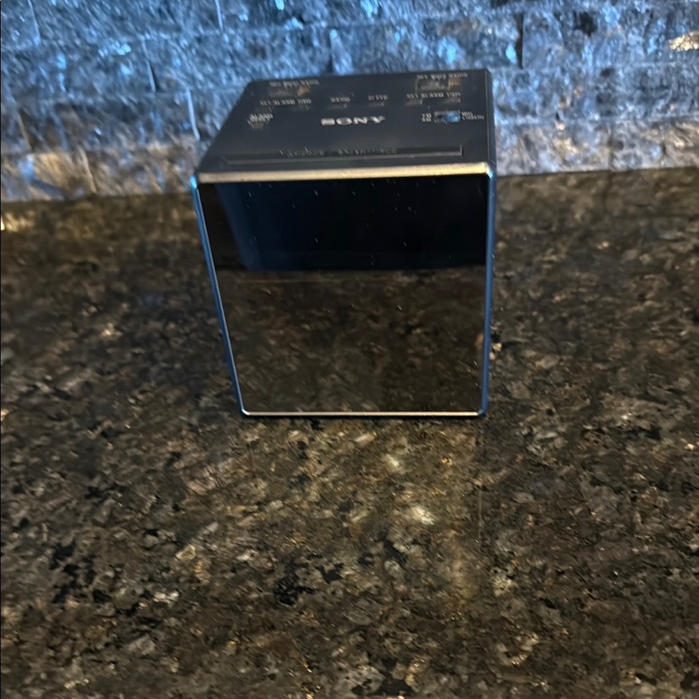 Sony Reflective Black Cube Alarm Clock.